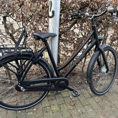Zwarte Cortina herenfiets, gerapporteerd met iLost