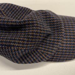 Cap Cos, bruin-zwart, segundo informou Pathé Schouwburgplein usando iLost