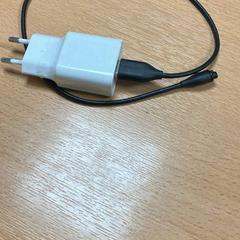 Caricabatterie, come riportato da Sheraton Brussels Airport Hotel utilizzando iLost