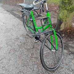 groene damesfiets, gerapporteerd met iLost