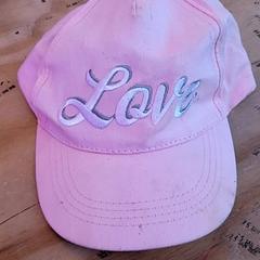 Cap Roze love pet, come riportato da Schaatsbaan Rotterdam utilizzando iLost