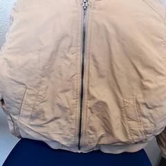 Giacca Beige, come riportato da Familiepark Drievliet utilizzando iLost