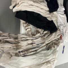 Ruházat, amint azt Silver Sands Beach az iLost segítségével jelentette.