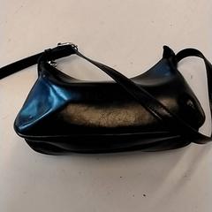 Taška Busscher, jak nahlášeno HTM pomocí iLost