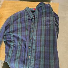 Camicia checkered, blue and green, come riportato da Conscious Hotel Westerpark utilizzando iLost