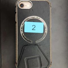 Smartphone Apple wit met roze achterkant, come riportato da Werchter Boutique utilizzando iLost