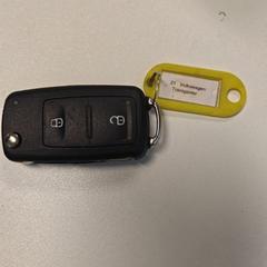 Chave Sleutel met gele sleutelhanger, como reportado por Gemeente Zonhoven utilizando o iLost