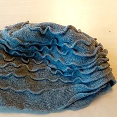 Kleding  - Muts grijs, zoals gemeld door Centraal magazijn met iLost