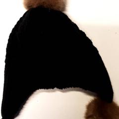 Cap zwart met bruin, come riportato da Qbuzz ZHN utilizzando iLost