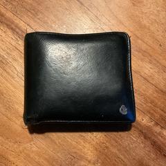 Zwarte herenportomonaie, ha sido reportado a iLost