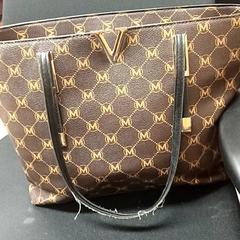 Borsetta Bruin, come riportato da Qbuzz GD Groningen Peizerweg utilizzando iLost