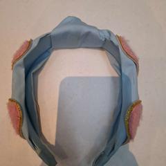 Gumička do vlasů Blauw met hartjes, jak nahlášeno Rijksmuseum van Oudheden pomocí iLost