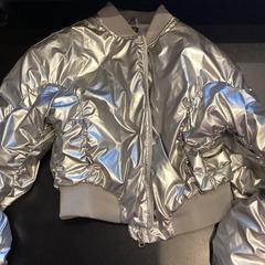 Jaqueta, segons ha informat Johan Cruijff ArenA mitjançant iLost