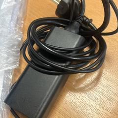 Adaptador, segons ha informat Sheraton Brussels Airport Hotel mitjançant iLost