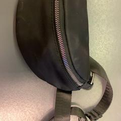 Fanny pack zwart, zoals gemeld door Eindhoven Airport met iLost