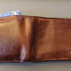 Bruine portemonnee, som rapportert til iLost