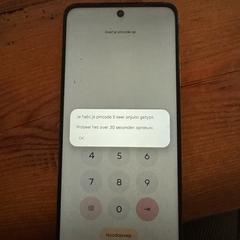 Groene Motorola Mobiele Telefoon met hoesje, jak bylo nahlášeno na iLost