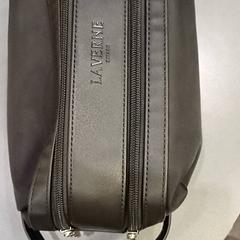 Borsa da toilette, come riportato da Qbuzz GD Groningen HS utilizzando iLost