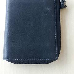 Carteira Martens, como reportado por Centraal magazijn utilizando o iLost