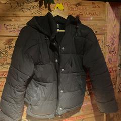 Black puffy jacket, as reported by Club Nyx/Exit Café using iLost
