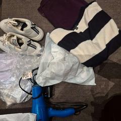 Roupa & Eletrónica, como reportado por The Dominican utilizando o iLost