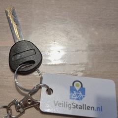 Fietssleutel met fietstallinglabel, som rapporterats till iLost