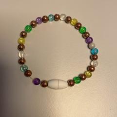 Pulseira, como reportado por Pathé Schiedam utilizando o iLost