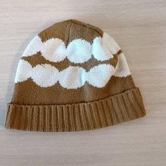 Muts bruin-wit, zgłoszono przez Centraal magazijn przy użyciu iLost