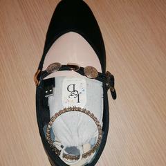 Schuh black, gemeldet von The Dominican über iLost