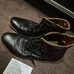 Sapato black, como reportado por The Dominican utilizando o iLost