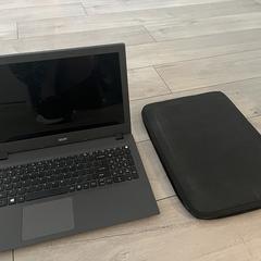 Laptop Acer zwart in zwarte hoes, iLost-i jakinarazi zaion moduan