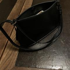 Zwart kunstleren tasje, ako bolo nahlásené iLost