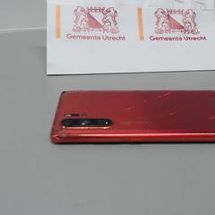 Mobiltelefon Huawei rood, rapporterat av Gemeente Utrecht med iLost