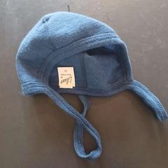 Čepice, jak nahlášeno Conscious Hotel Westerpark pomocí iLost