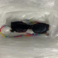 Gafas de sol, ha sido reportado por Silver Sands Beach con iLost