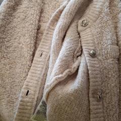 Gyerekmellény Blanc en laine, amint azt IKEA Paris - Plaisir az iLost segítségével jelentette.