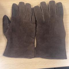Guanti Bruin suede, come riportato da Pathé Amsterdam Noord utilizzando iLost