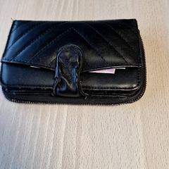 Peňaženka M. Abidar, ako bolo nahlásené Gemeente Roermond pomocou iLost