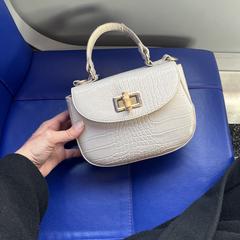 Handtasje beige, come riportato a iLost