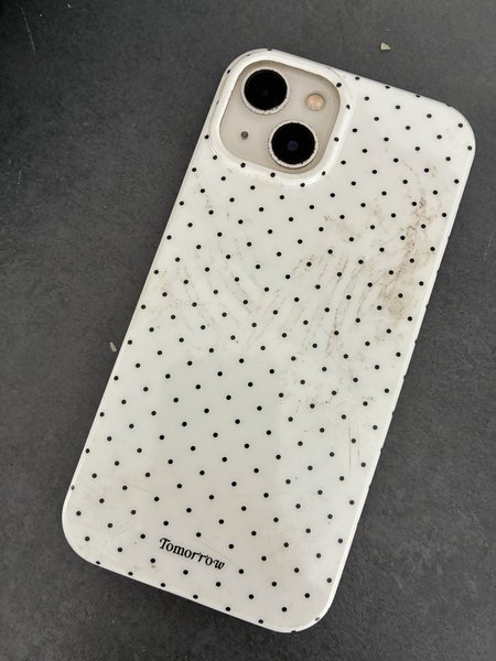Mobiele telefoon iPhone, wit hoesje
