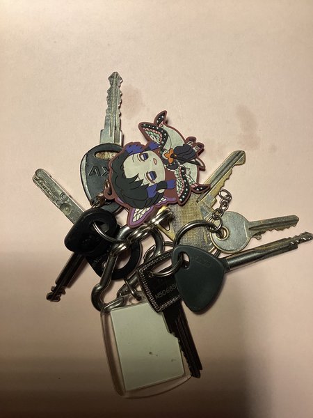 Keys Met daaraan een pasfoto