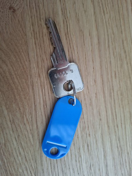 House key Met blauwe sleutelhanger